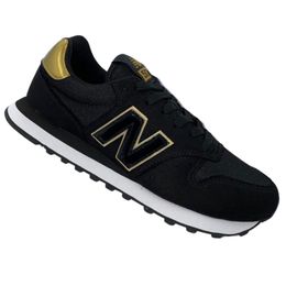 new balance preto e dourado